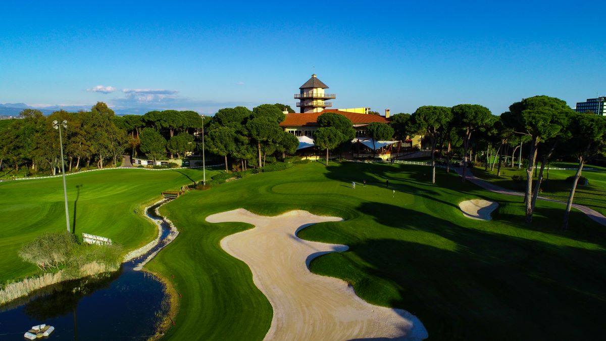 Clubhouse in the distance at Montgomerie Maxx Royal Golf Course