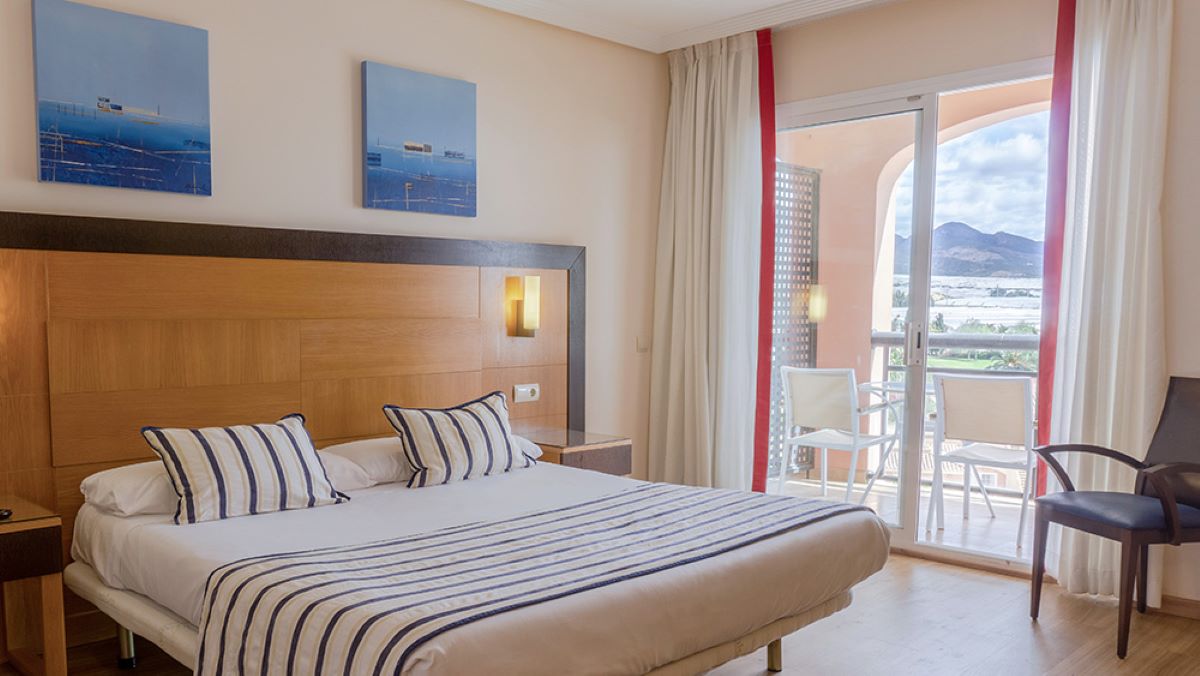 Double bed in room at Hotel Bonalba Alicante