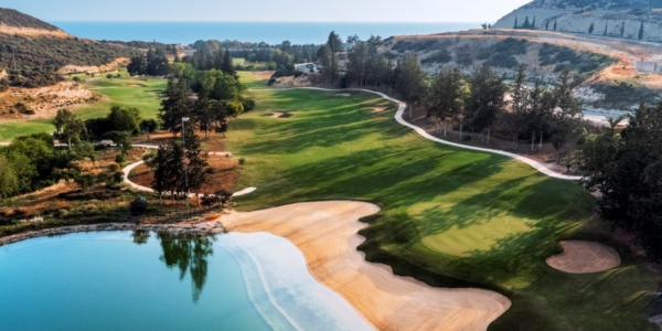 Water lapping up to the golf course at Secret Valley Golf Club in Paphos