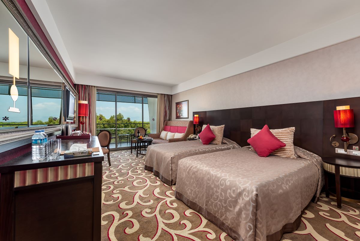 Twin beds in classic rooms in Cornelia Diamond Resort