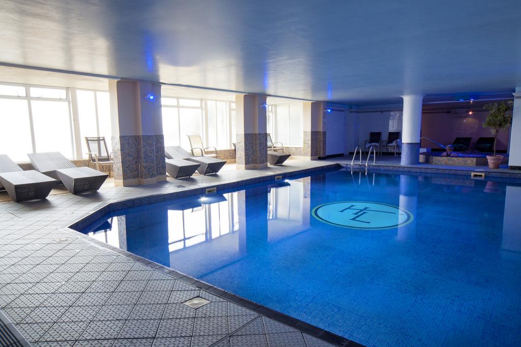 Indoor heated swimming pool at Hellidon Lakes Golf & Spa Hotel