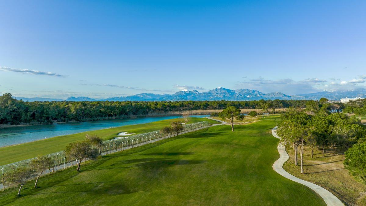 River and mountains under blue sky at Cullinan Belek Resort in Turkey