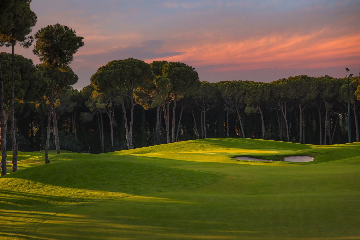 Sunset at Carya Golf Club with purple sky