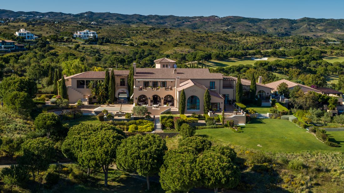 Clubhouse with trees surrounding at Monte Rei Golf & Country Club 3ab