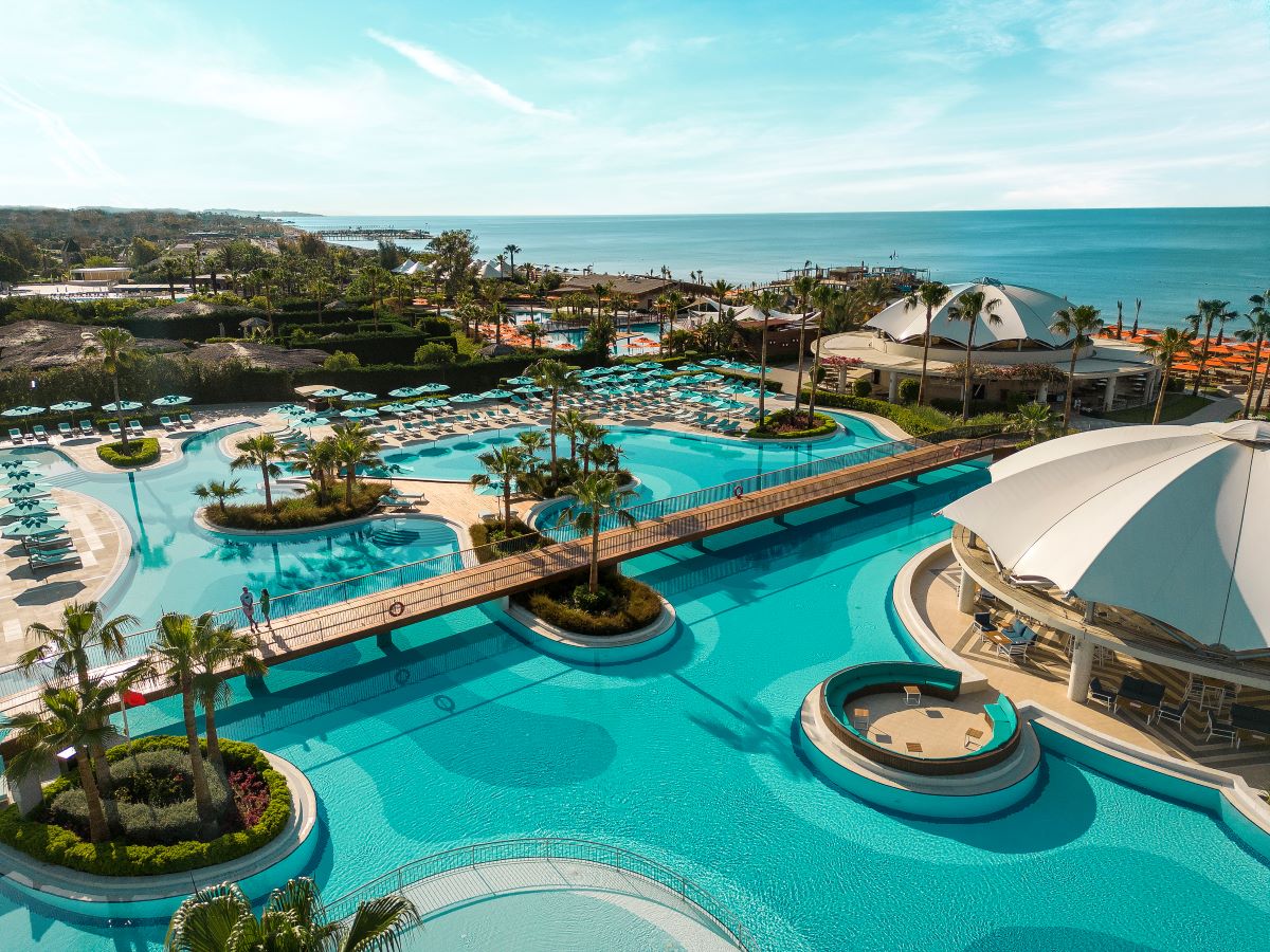 Bridge over swimming pools at Kaya Palazzo Golf Resort