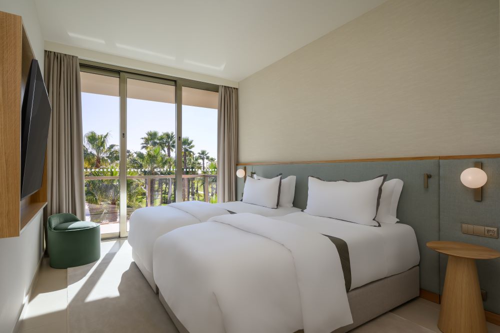 Twin beds in room at The Westin Algarve Salgados Beach Resort