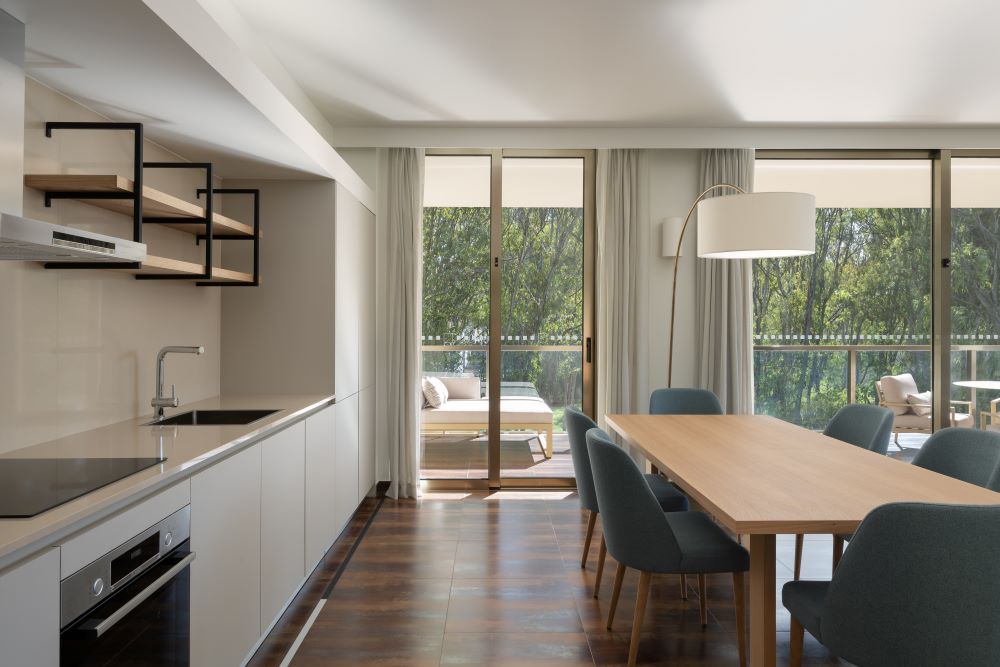 Table and chairs in dining area at Marriott Residences Salgados Resort