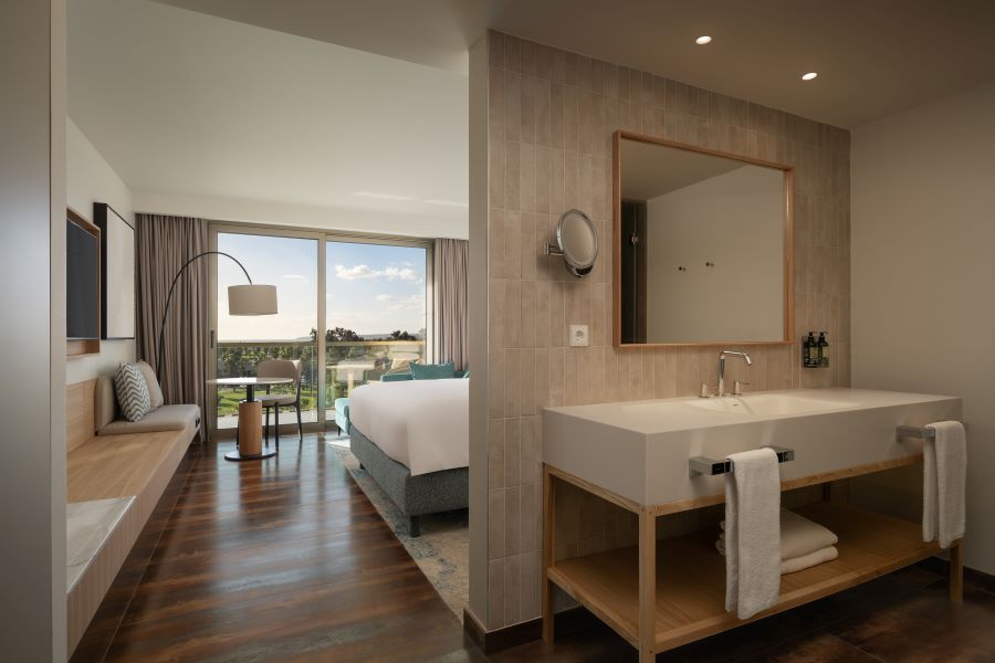 Bathroom leading to bedroom at Algarve Marriott Residences Salgados Resort & Conference Centre