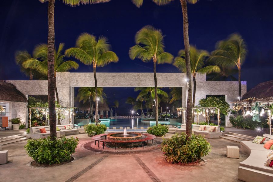 Evening at Ambre Mauritius in pool and patio area