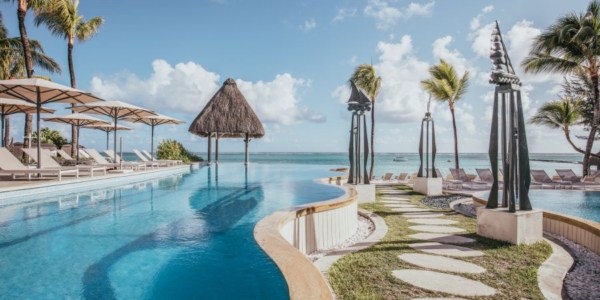 Pool leading down to beach at Ambre Mauritius Resort