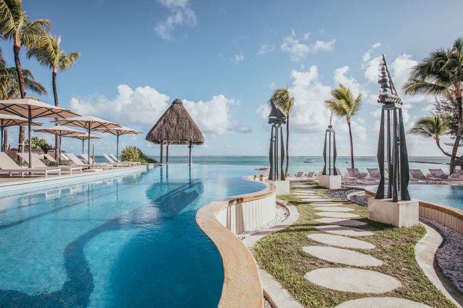 Pool leading down to beach at Ambre Mauritius Resort