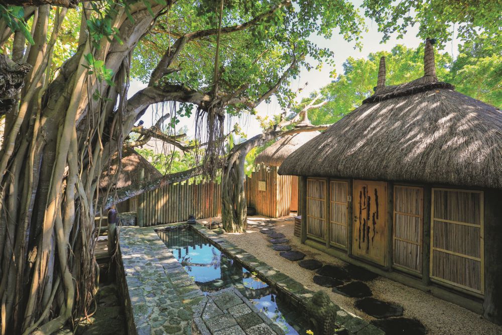 Stream running around the spa at Canonnier Beachcomber Golf Resort & Spa