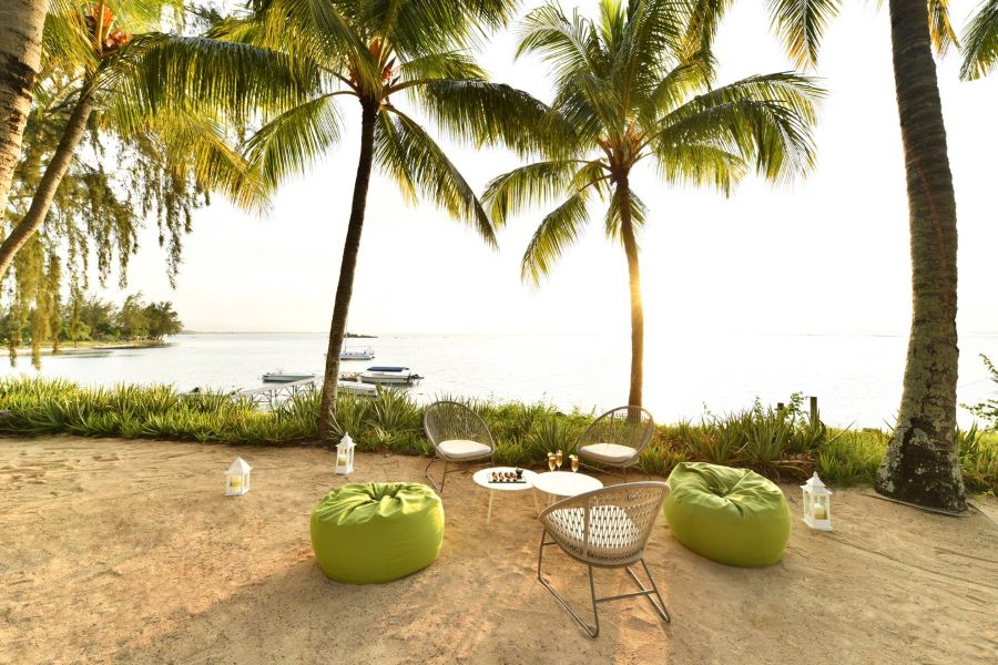 Green bean bags on beach at Canonnier Beachcomber Golf Resort & Spa