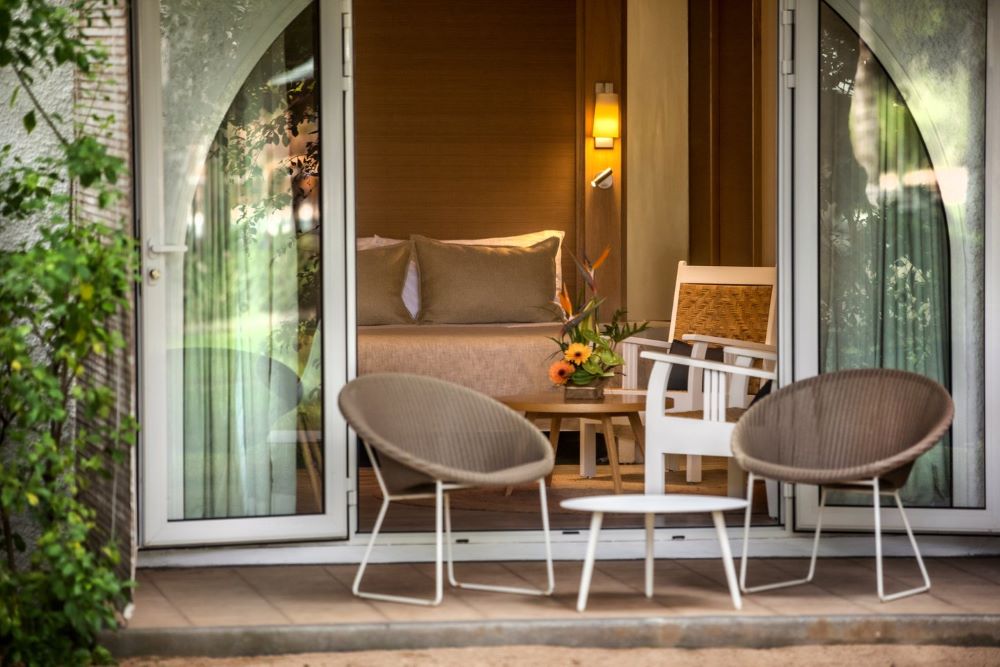 Outdoor furniture outside the room at Canonnier Beachcomber Golf Resort & Spa