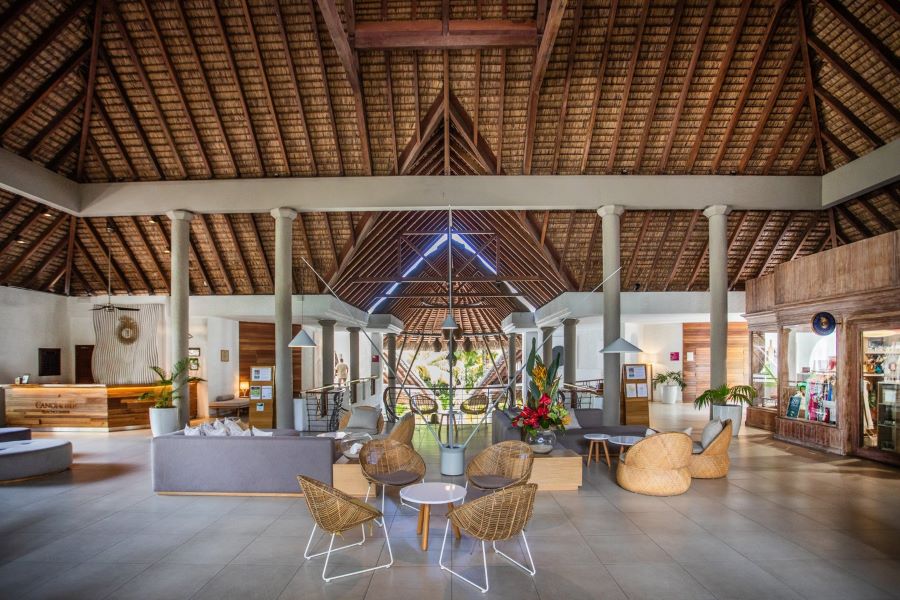 Table and chairs in lobby area at Canonnier Beachcomber Golf Resort & Spa