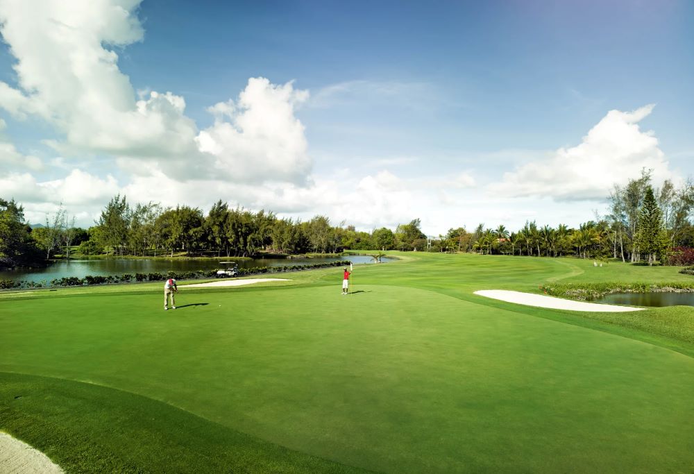 Golfers on the course at Legend Golf Course in Mauritius