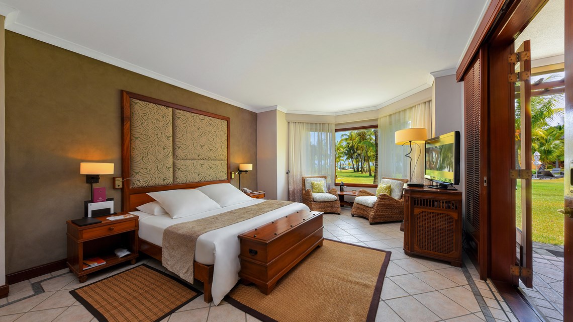 Bedroom at Dinarobin Beachcomber Golf Resort & Spa in Mauritius