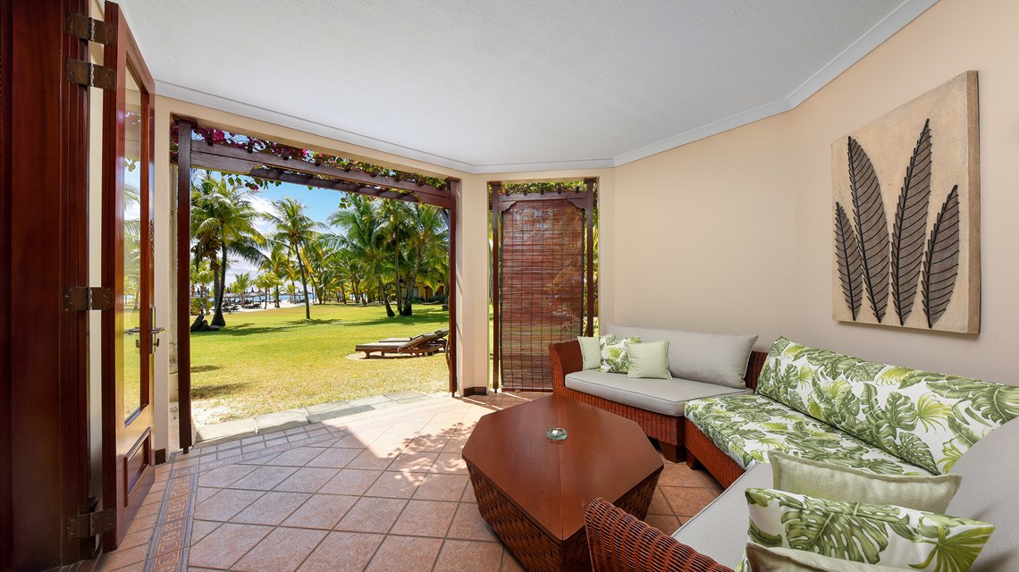 Tiled floor in bedroom at Dinarobin Beachcomber Golf Resort & Spa