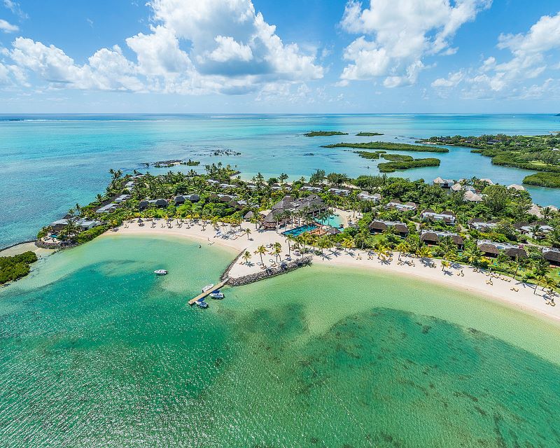 Four Seasons Resort Mauritius at Anahita on the beach, facing the Indian Ocean and surrounded by turquoise water