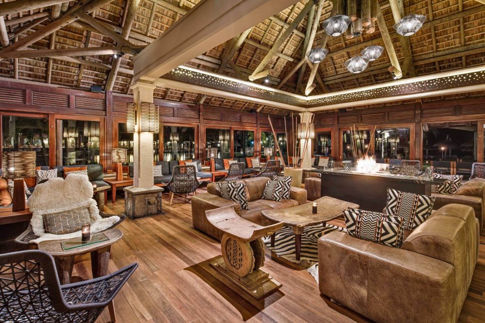 Bar with leather sofas at Heritage Awali Golf & Spa Resort