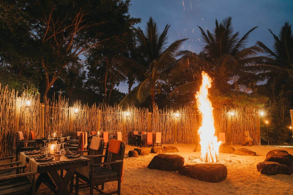 Outdoor fire pit and seating at Heritage Awali Golf & Spa Resort