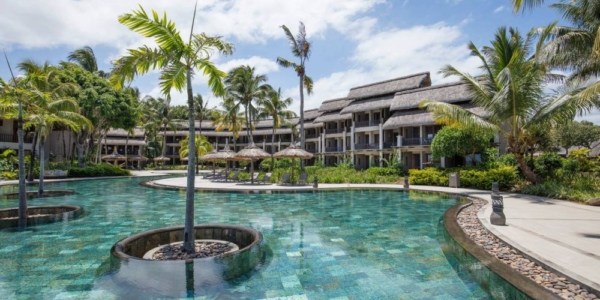 Swimming pool overlooked by the accommodation at Heritage Awali Golf & Spa Resort