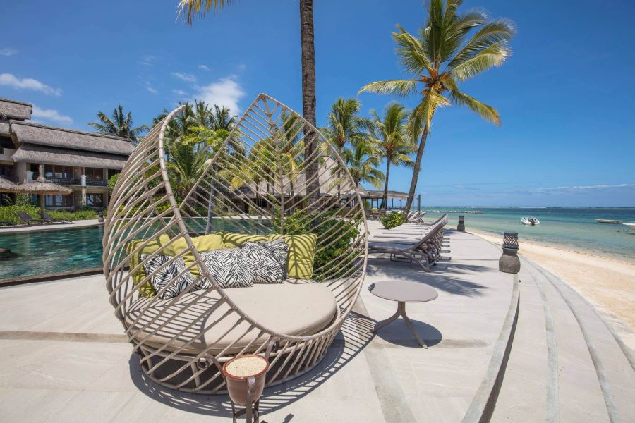 Sun beds on the white sand beach at Heritage Awali Golf & Spa Resort