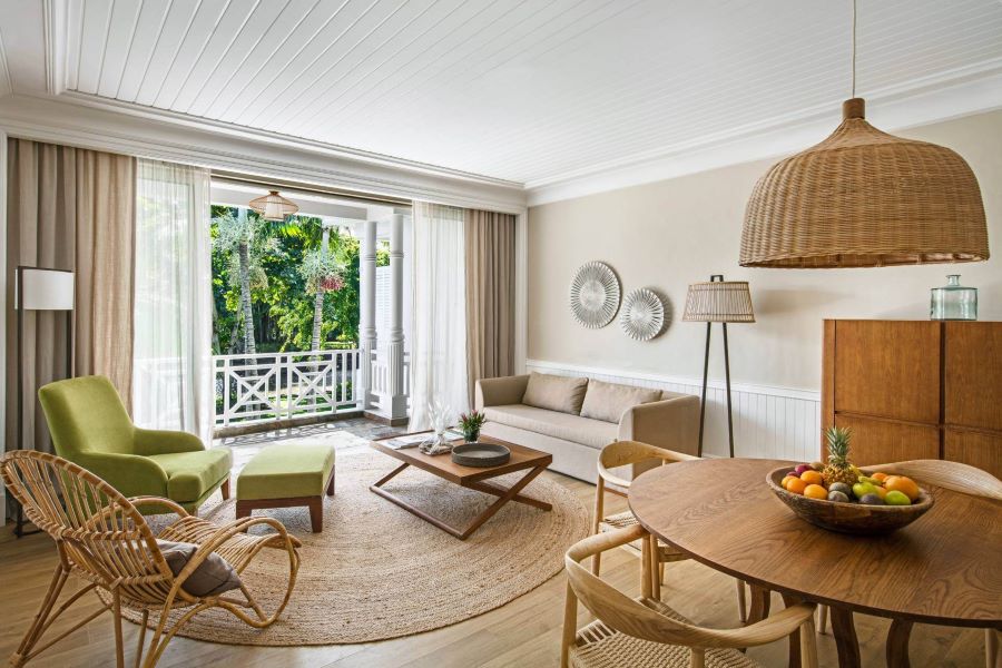 Sofa in living area in room at Heritage Le Telfair Golf & Wellness Resort in Mauritius