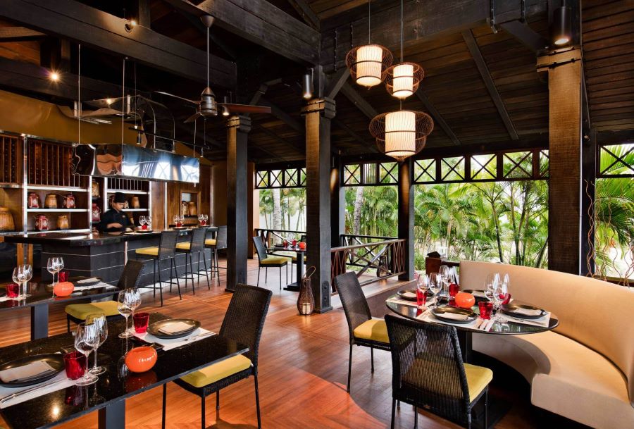 Dining tables set for service at Heritage Le Telfair Golf & Wellness Resort in Mauritius