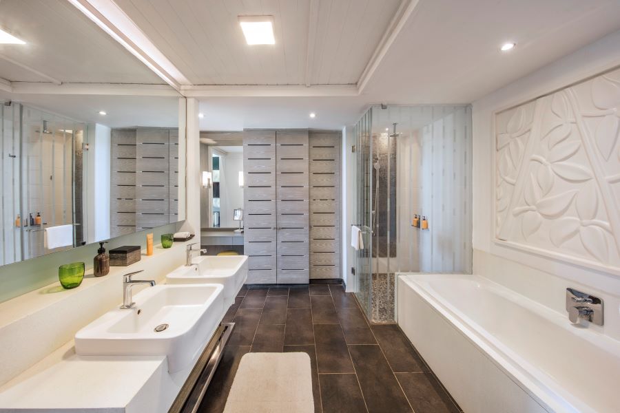 Bathroom at Long Beach Mauritius with separate shower and bath tub