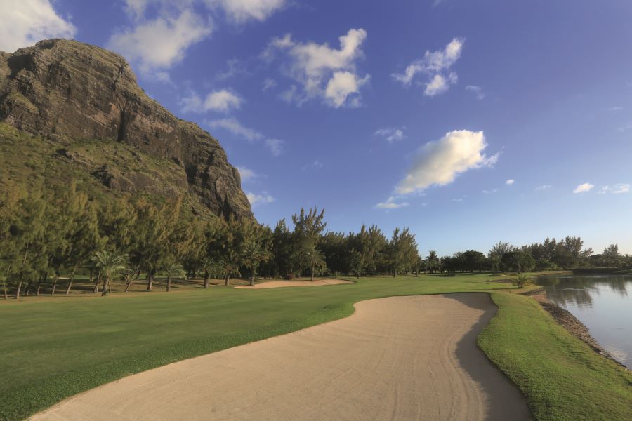 Huge sand bunker with blue sky overlooking the course at Paradis Golf Club