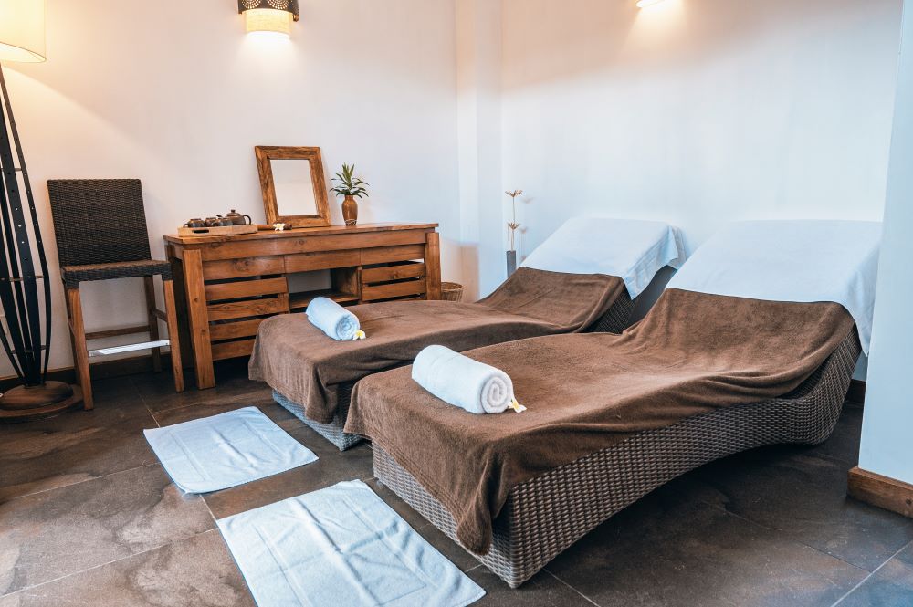 Twin beds in treatment room at Tamarina Golf & Spa Boutique Hotel