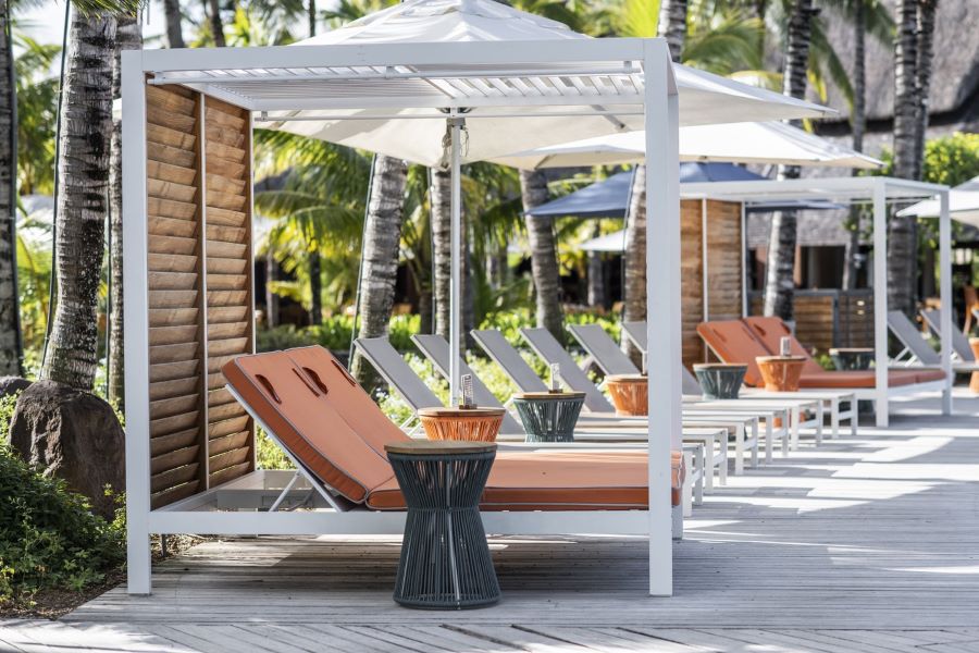 Red sun loungers at Trou aux Biches Beachcomber Golf Resort & Spa