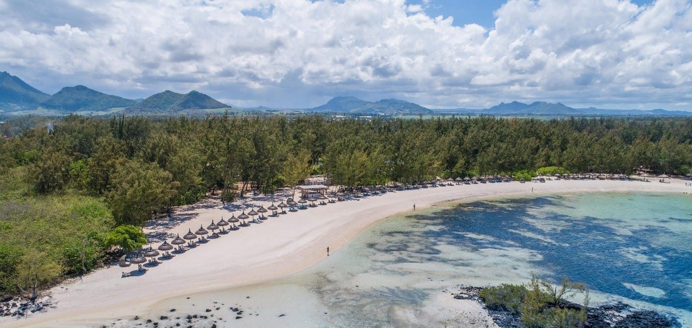 Sun loungers on the beach at Anahita Golf And Spa Resort