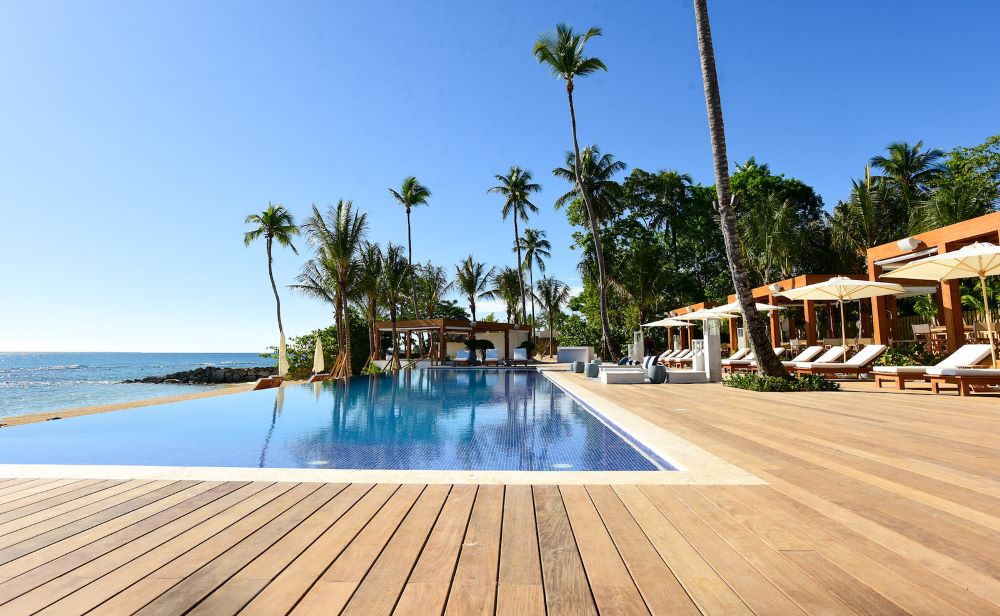 Swimming pool surrounded by decking at Casa de Campo Resort & Villas