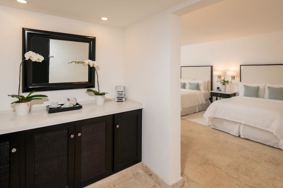 Bathroom and bedroom at Case de Campo Resort & Villas