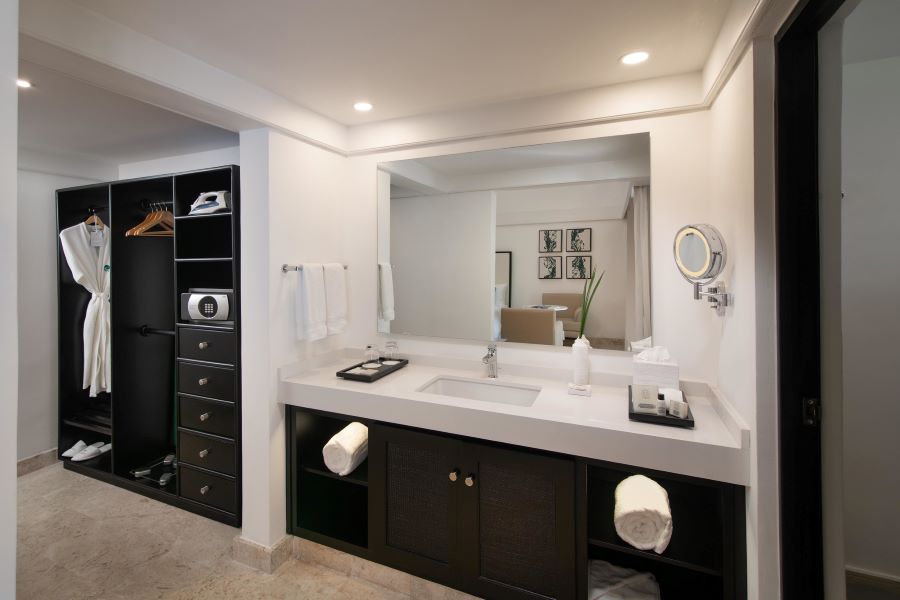 Bathroom at Casa de Campo Resort & Villas with large mirror and sink