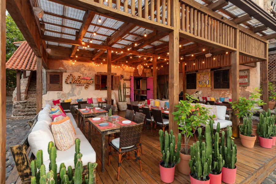 Restaurant with tables set for dining at Casa de Campo Resort & Villas