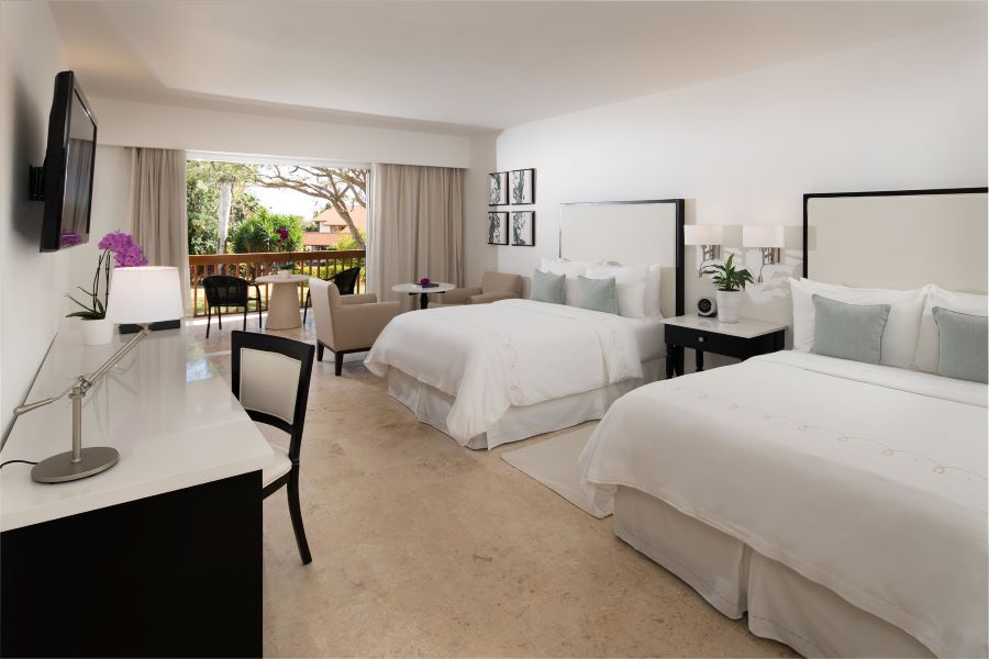 Bedroom with twin beds at Case de Campo Resort & Villas in Dominican Republic