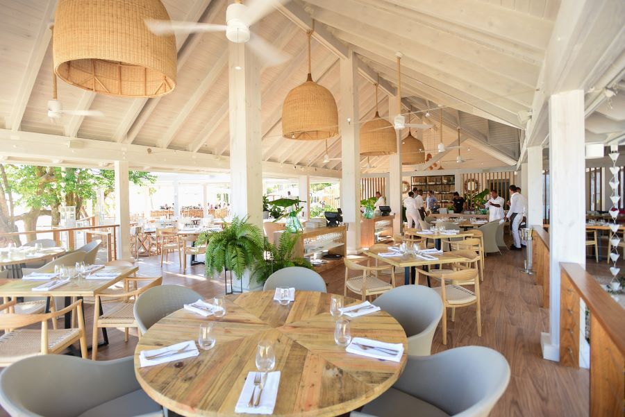 Restaurant with tables laid for guests at Casa de Campo Resort & Villas in Dominican Republic