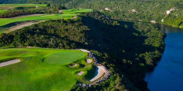 Amazing view of the putting green perched on the cliff top at Dye Fore Golf Course in Dominican Republic