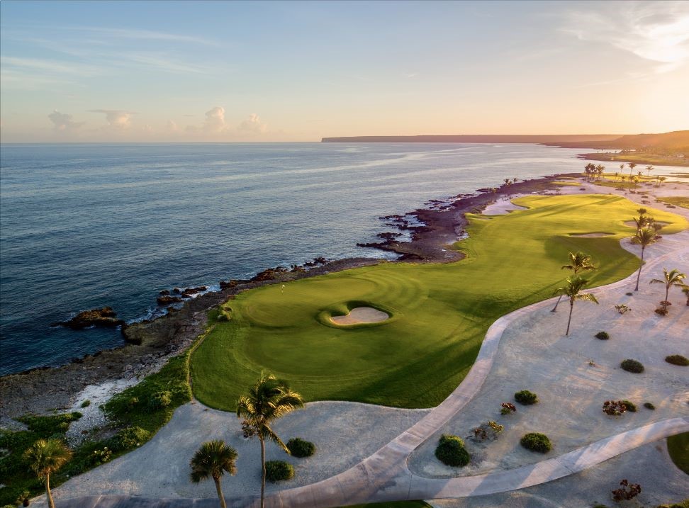 Punta Espada Golf Club in Dominican Republic with the sun setting in the background