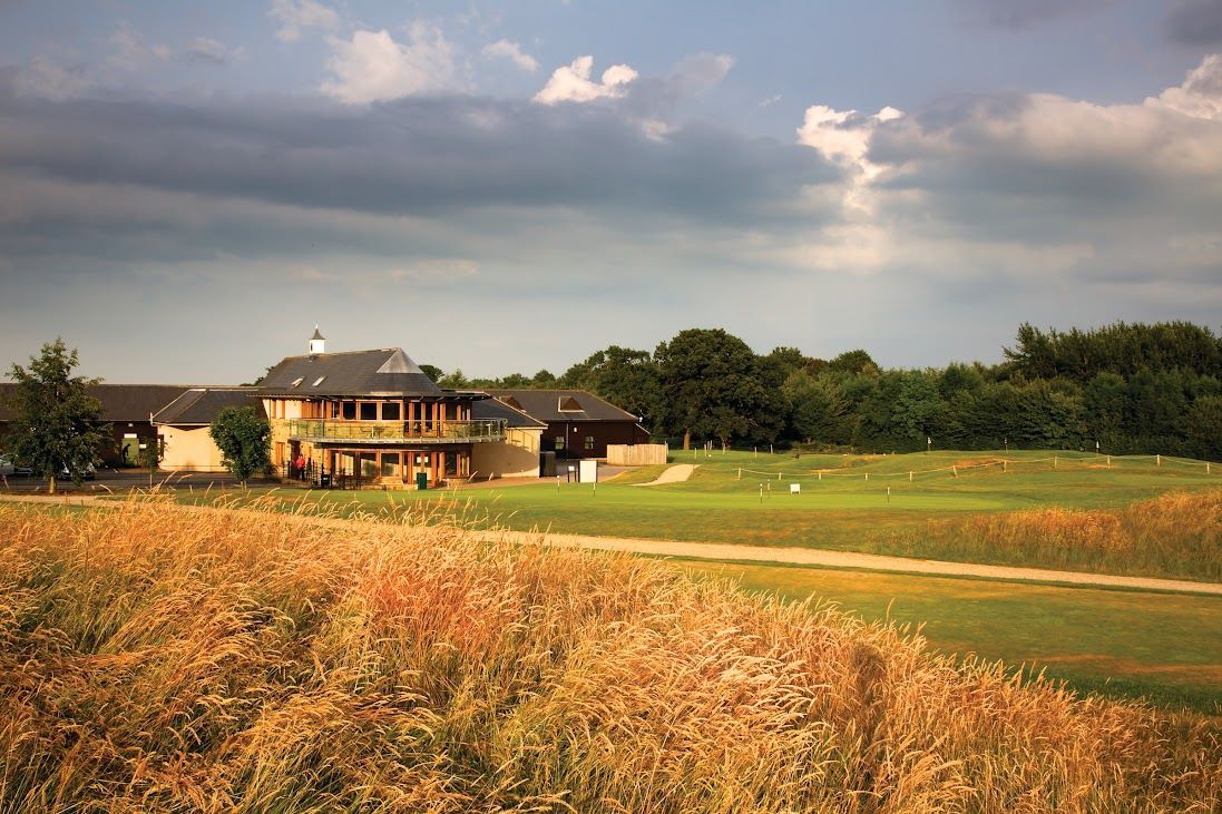 Club house in the distance of the golf course at Rudding Park