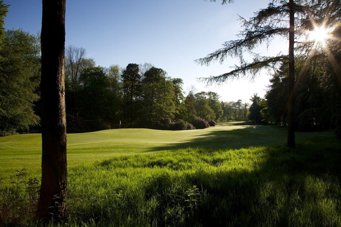 Shrubs and trees ahead of the green fairway at Rudding Park in Yorkshire