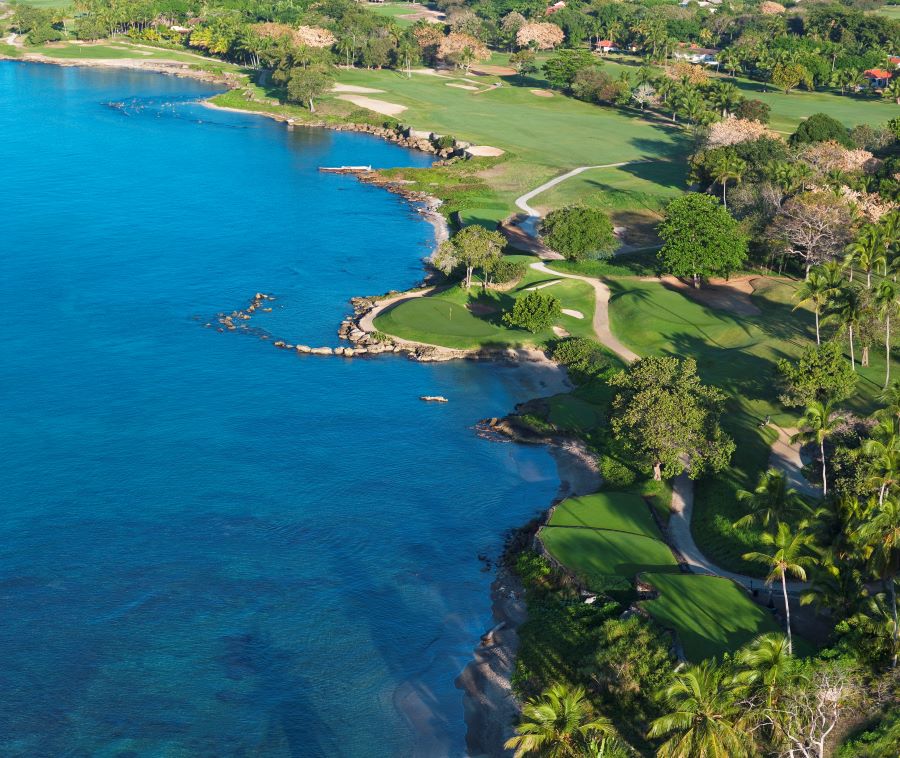 Deep blue sea water to the left of the golf course at Teeth of the Dog