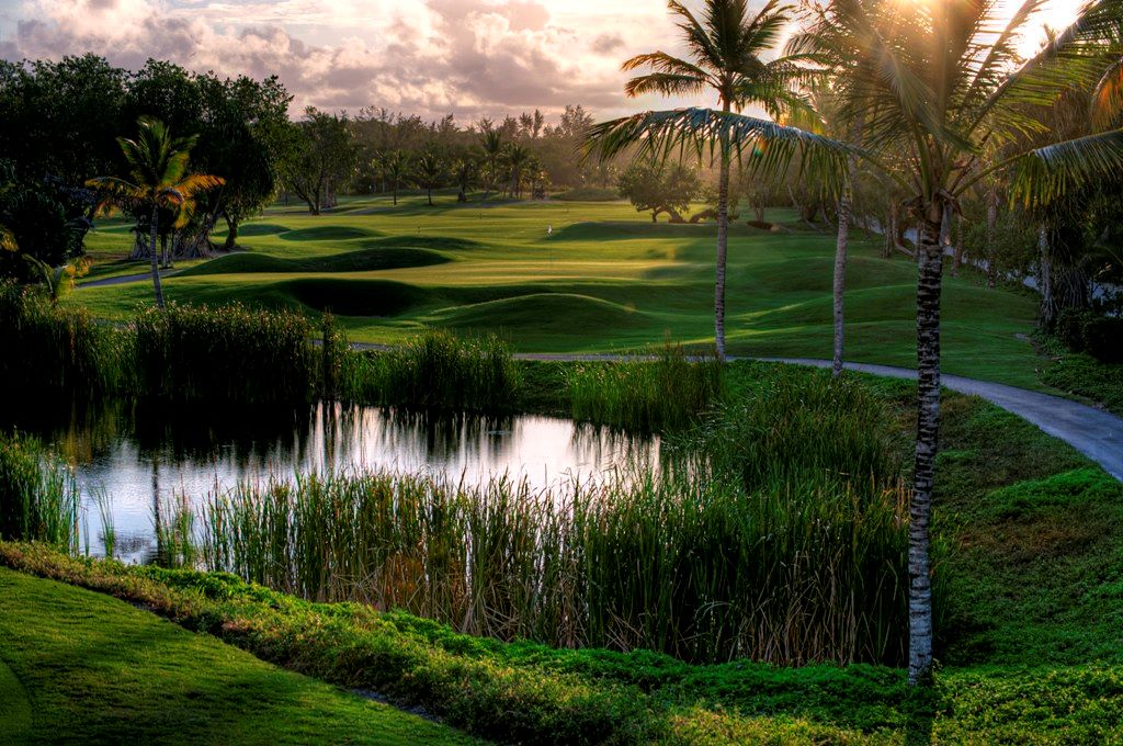 Sunset over the lake and golf course at The Lakes Barcelo Course in the Punta Cana region of the Dominican Republic