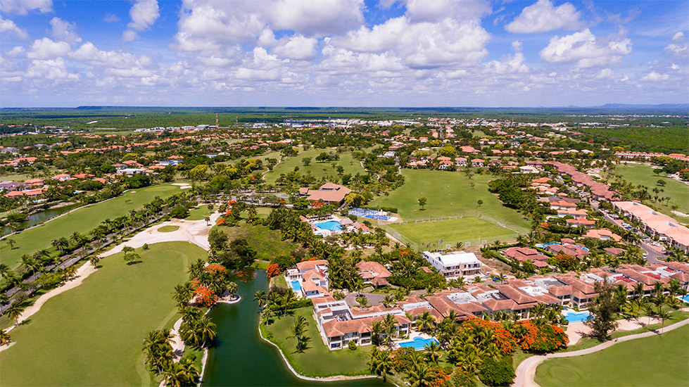 Cocotal Golf & Country Club from the air with accommodation surrounding the golf course