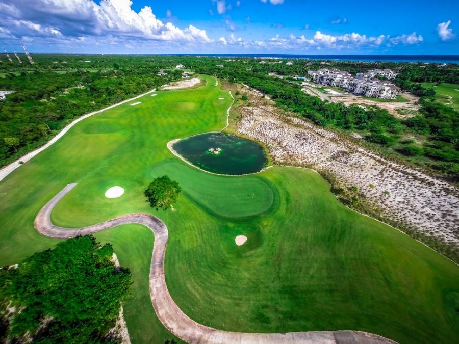 Lush green fairways at La Cana Golf in the Dominican Republic