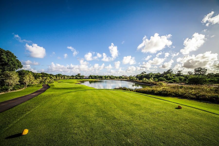 Blue sky and white clouds overhead at La Cana Golf