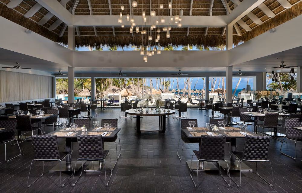 Restaurant with views out towards the sea at Melia Caribe Beach Resort